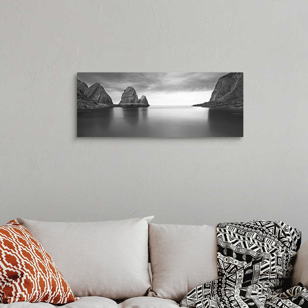 A bohemian room featuring Long exposure of seascape with rocks.