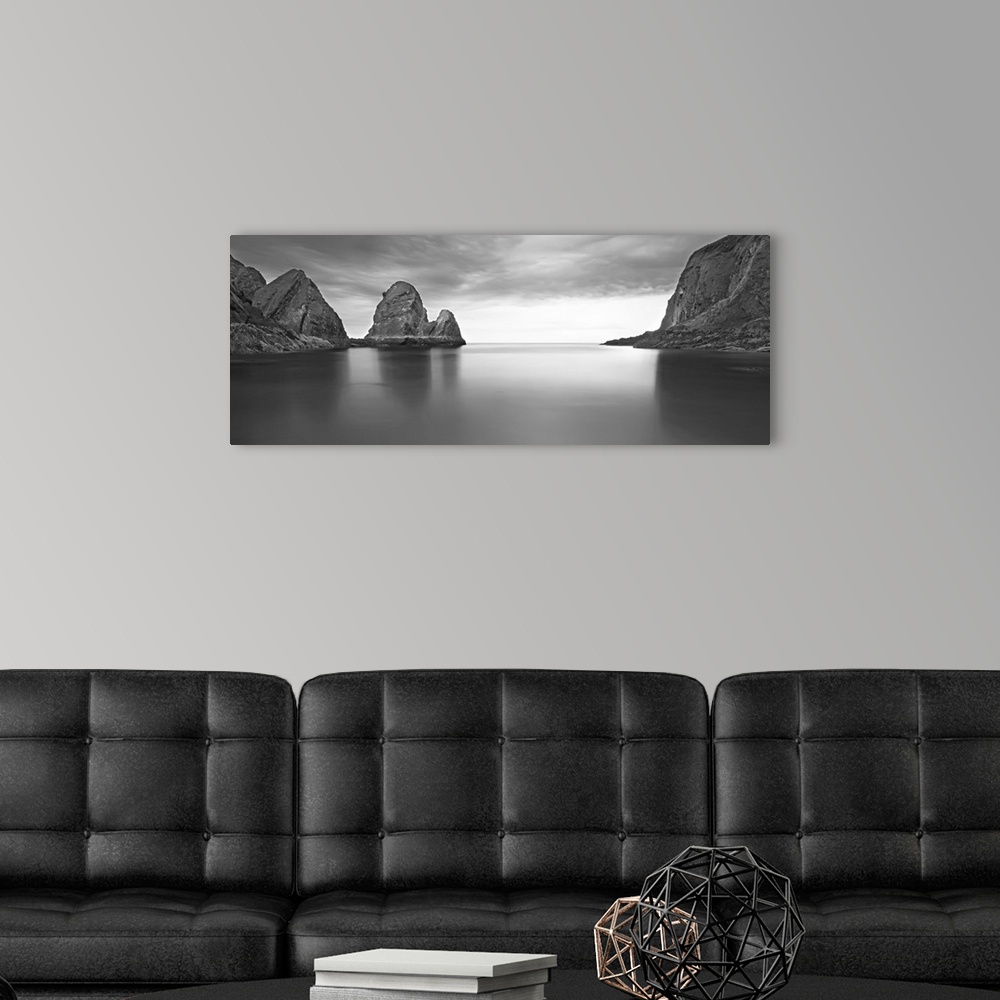 A modern room featuring Long exposure of seascape with rocks.