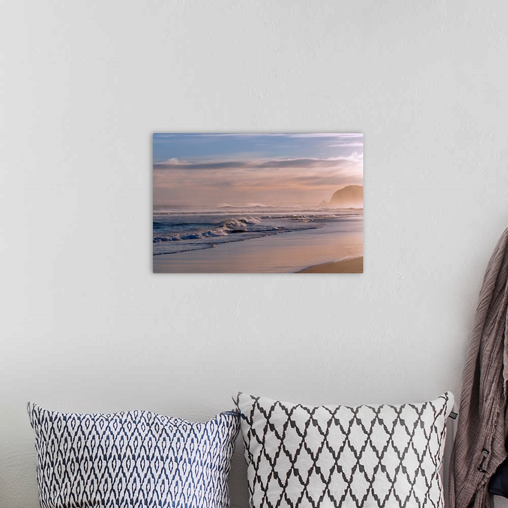 A bohemian room featuring Horizontal photograph on large canvas of waves crashing into the shoreline at St. Kilda, Dunedin....