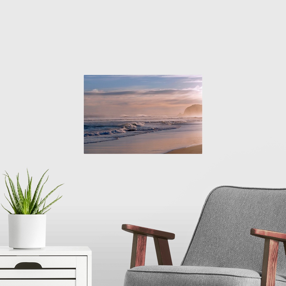 A modern room featuring Horizontal photograph on large canvas of waves crashing into the shoreline at St. Kilda, Dunedin....