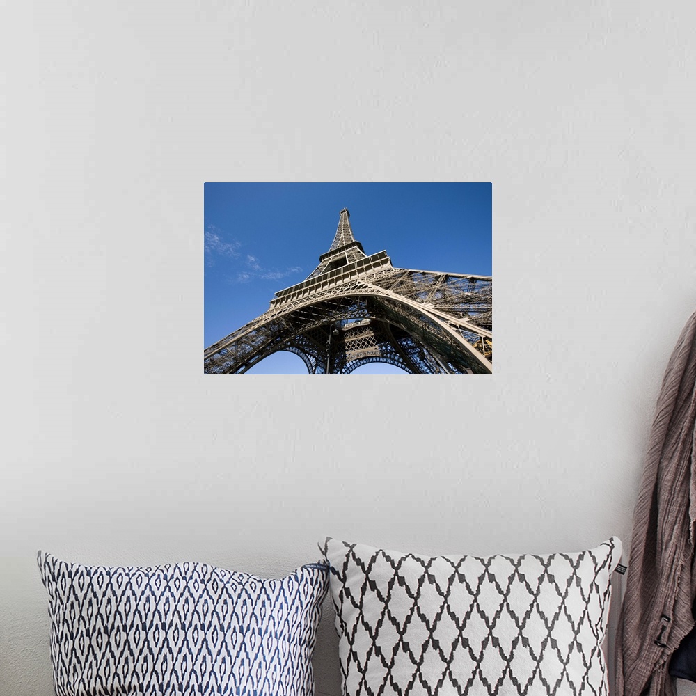 A bohemian room featuring wide view looking up at the Eiffel Tower