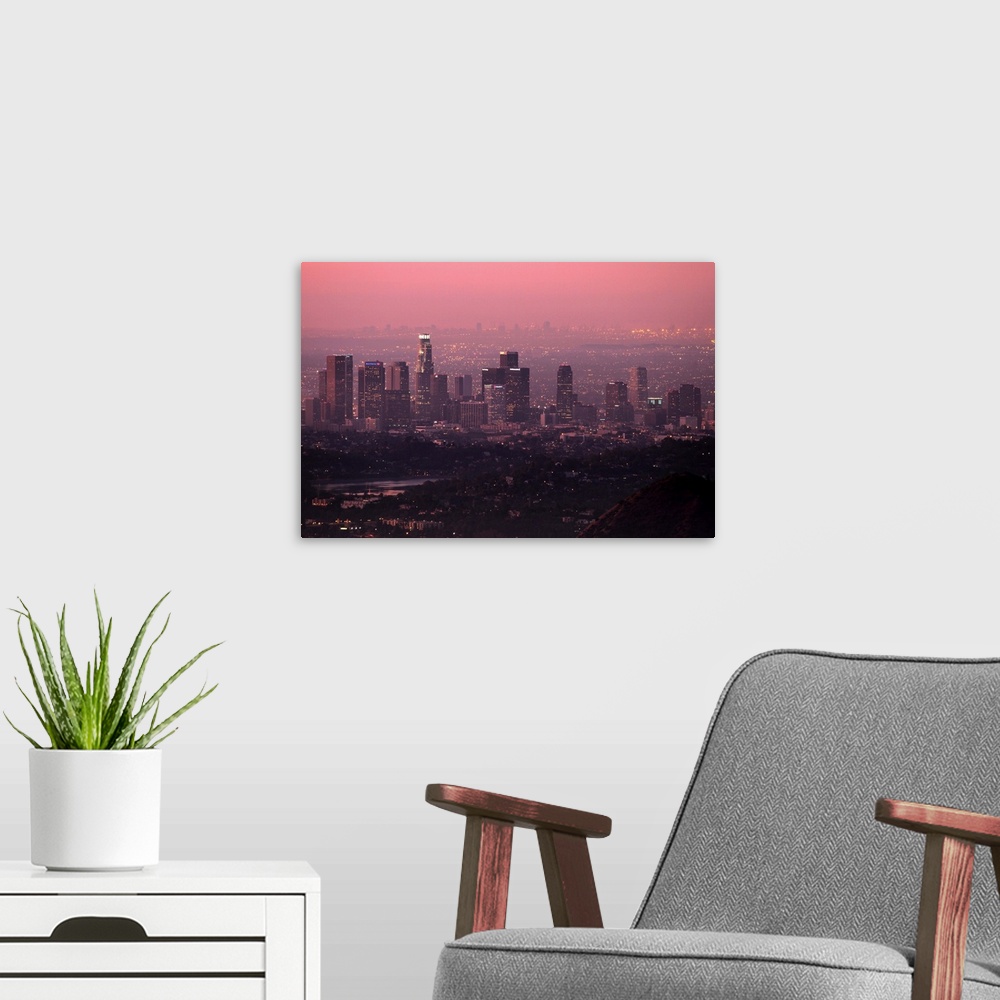 A modern room featuring Colorful predawn light falls on downtown Los Angeles. Silver Lake  visible in foreground.