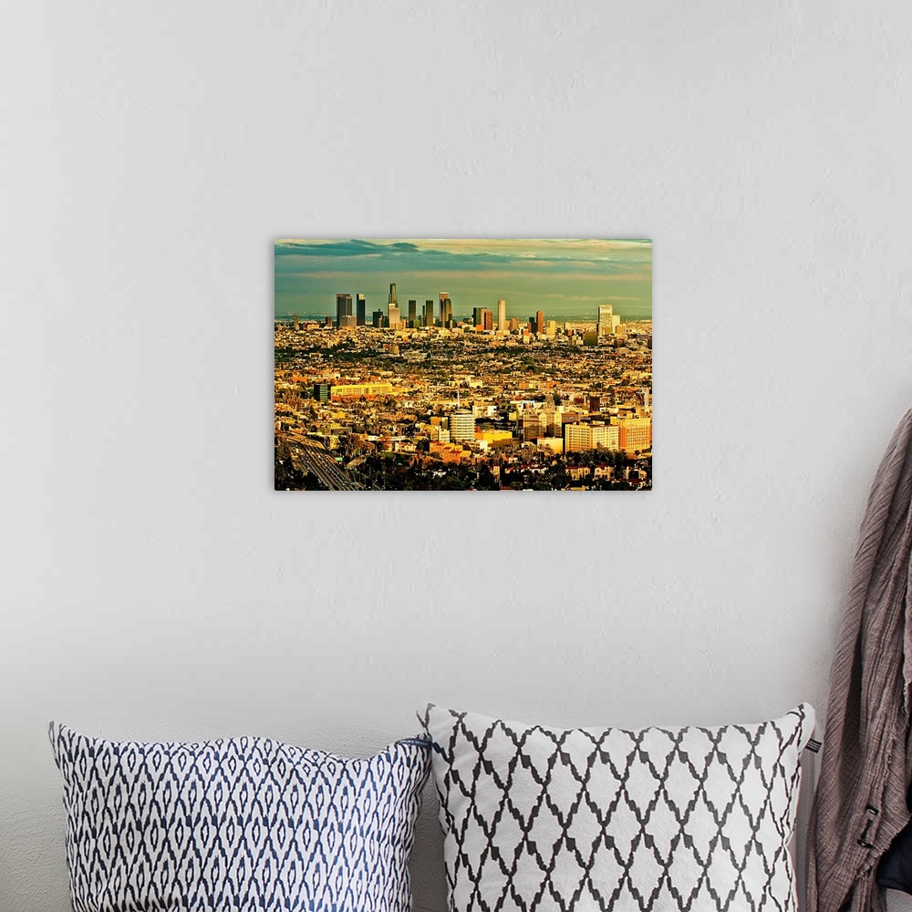 A bohemian room featuring Los Angeles from above with Hollywood in foreground and LA skyline in distance.