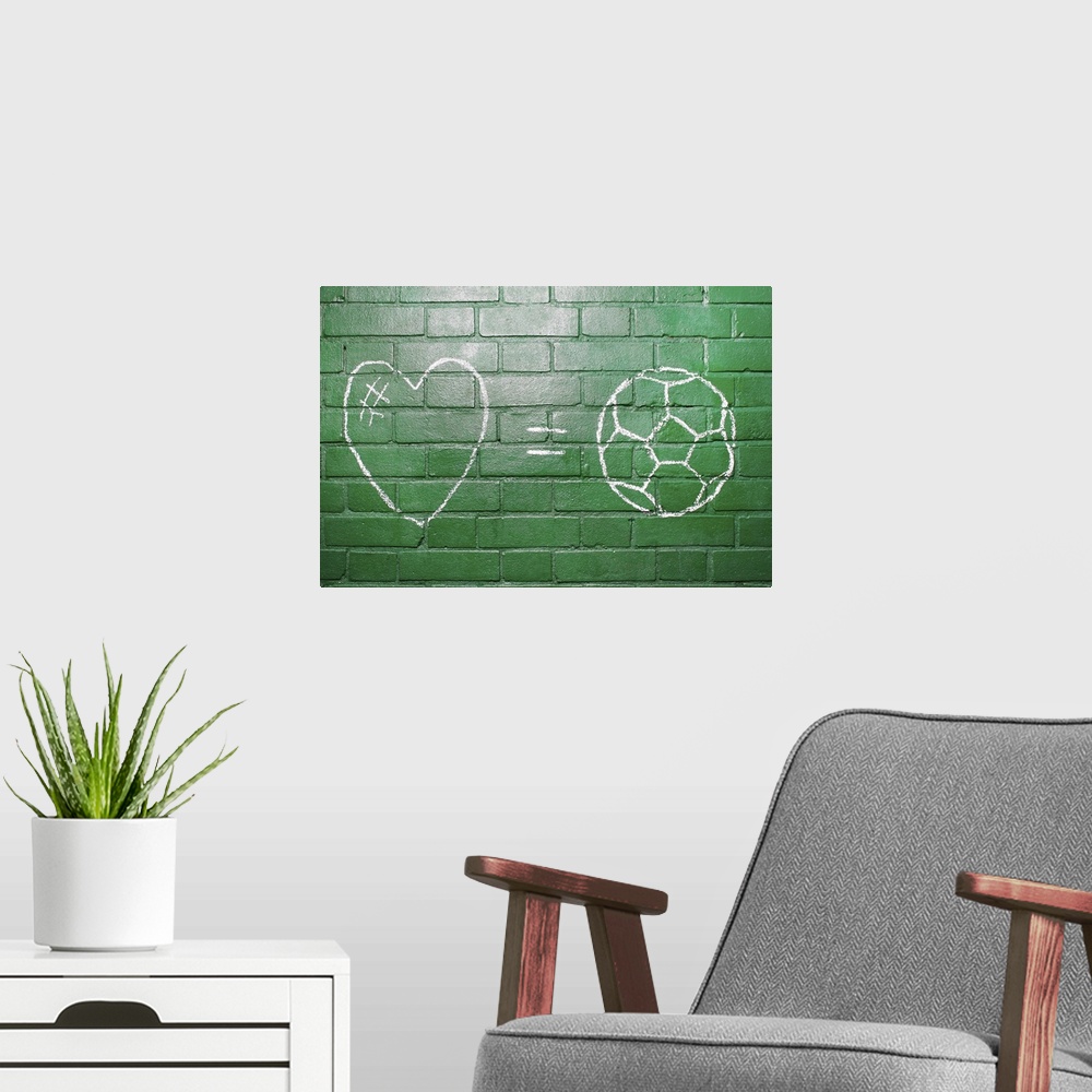 A modern room featuring Love = Football drawn in chalk on wall.