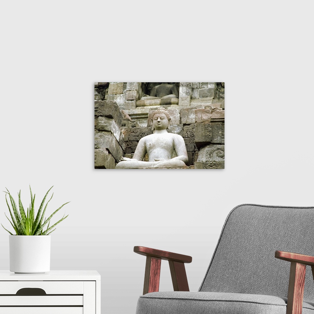 A modern room featuring Low angle view of the Statue of Buddha, Borobudur Temle, Java, Indonesia