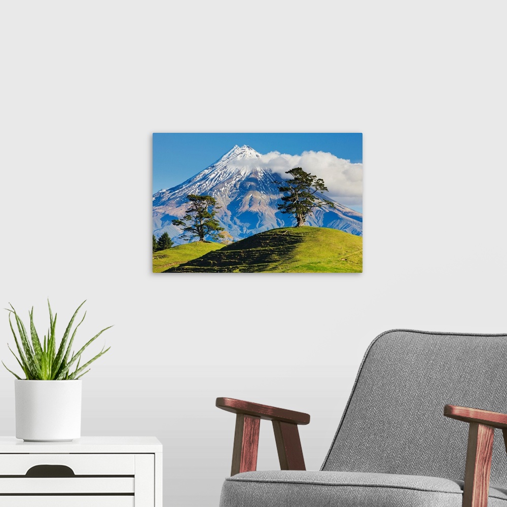 A modern room featuring Lush Hills In Front Of Mount Egmont