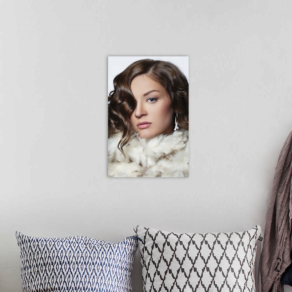 A bohemian room featuring Fashionable portrait of beautiful young woman wearing fur, professional make-up and hairstyle