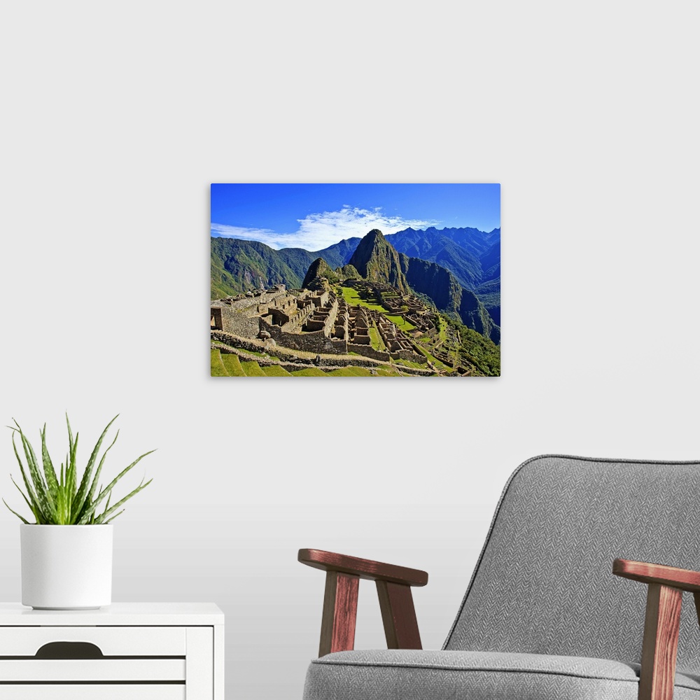 A modern room featuring Machu Picchu is a 15th century Inca site located 2,430 metres above sea level on a mountain ridge...