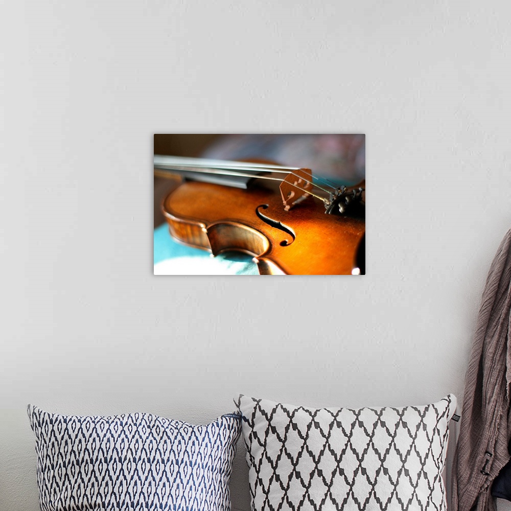 A bohemian room featuring Maggini's violin with beautiful sound.