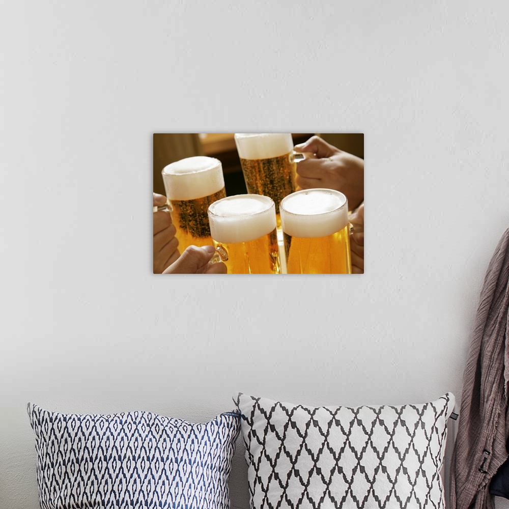 A bohemian room featuring Making a toast with beer