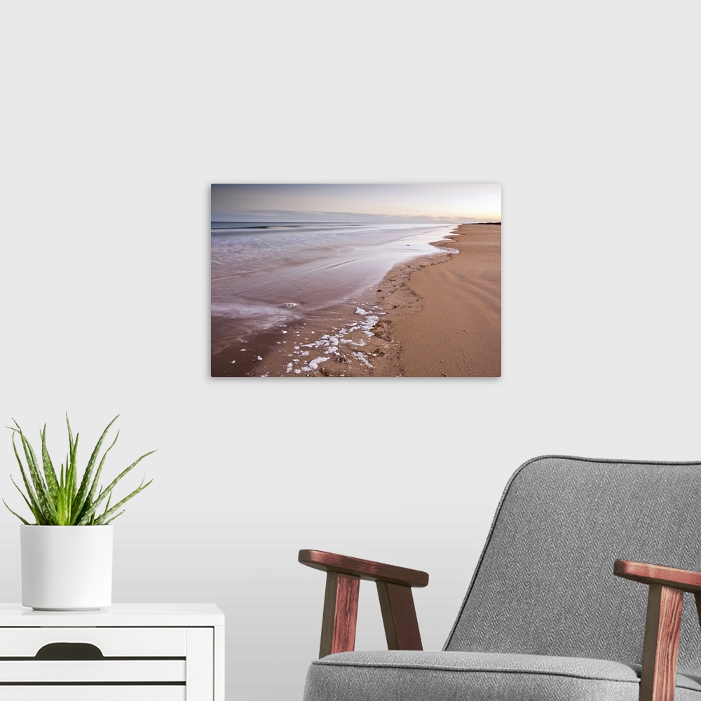 A modern room featuring Malaquite Beach and Gulf of Mexico at sunset on Padre Island National Seashore, Texas, USA