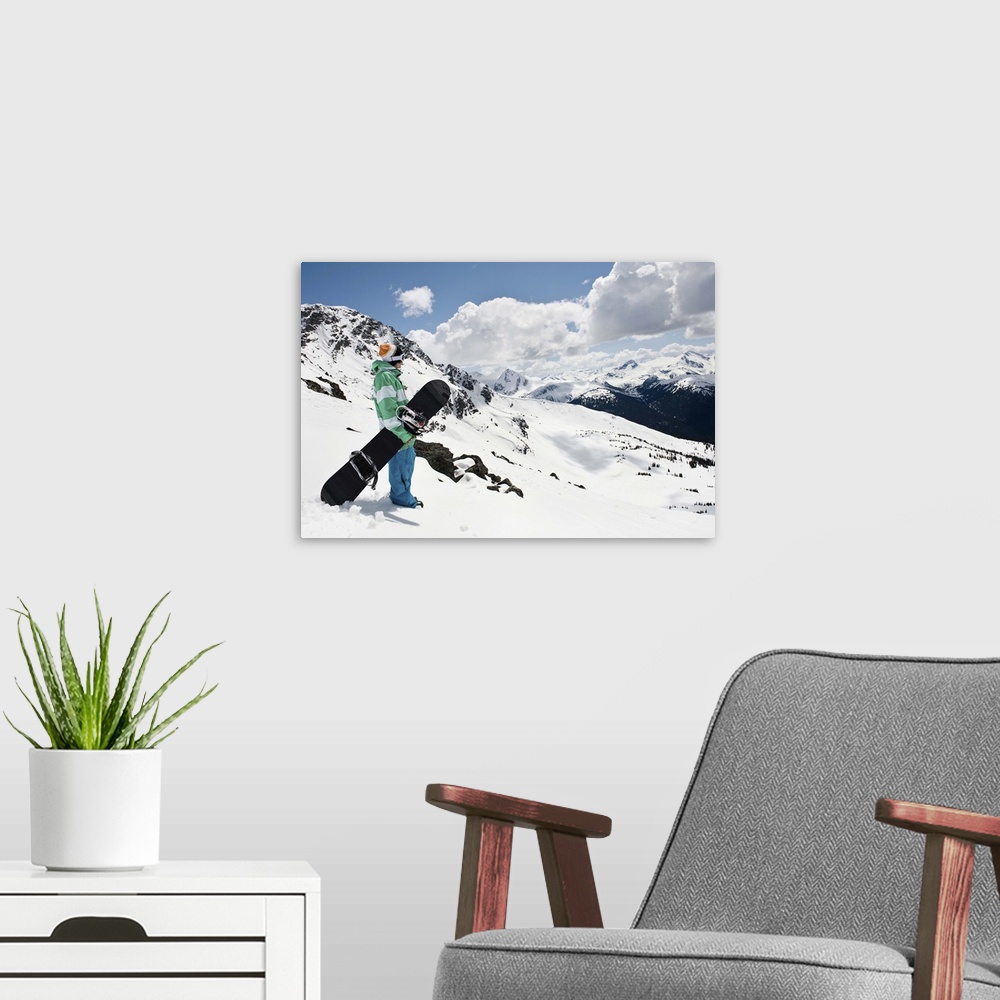 A modern room featuring Male snowboarder