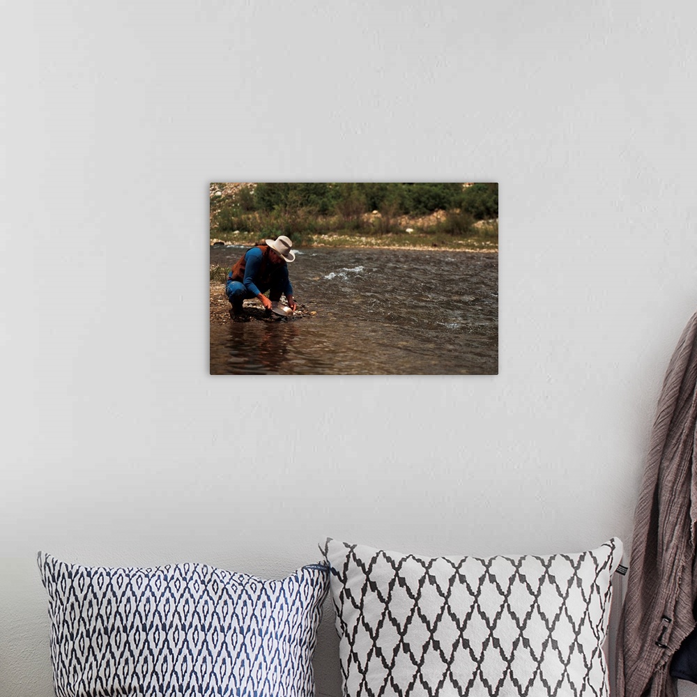 A bohemian room featuring Man Panning For Gold On The South Platte River