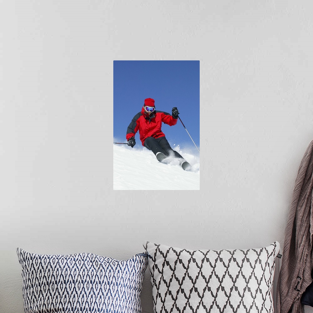 A bohemian room featuring Man snow skiing