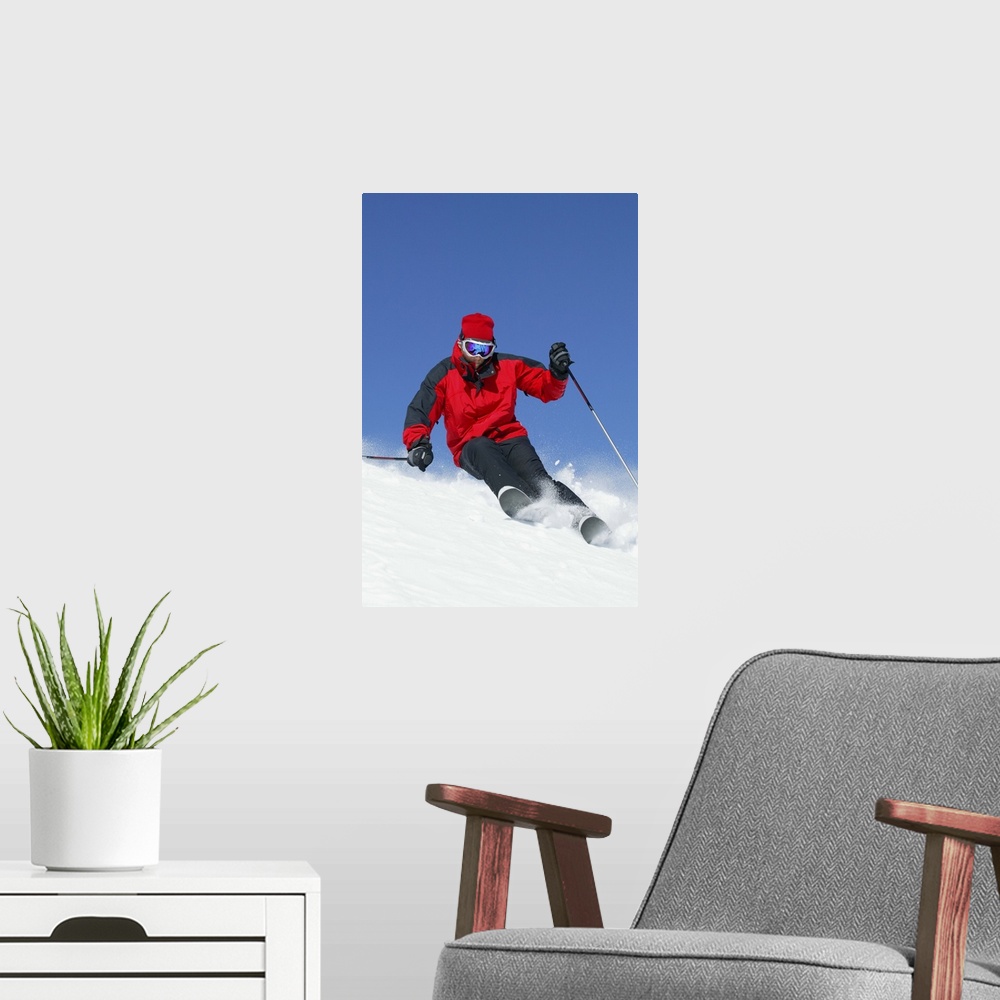A modern room featuring Man snow skiing