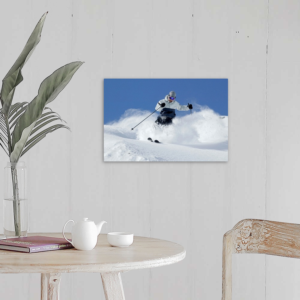 A farmhouse room featuring Man snow skiing