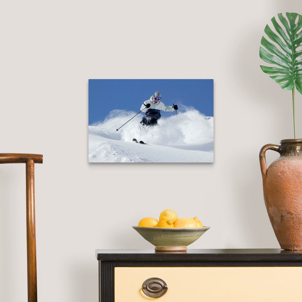 A traditional room featuring Man snow skiing