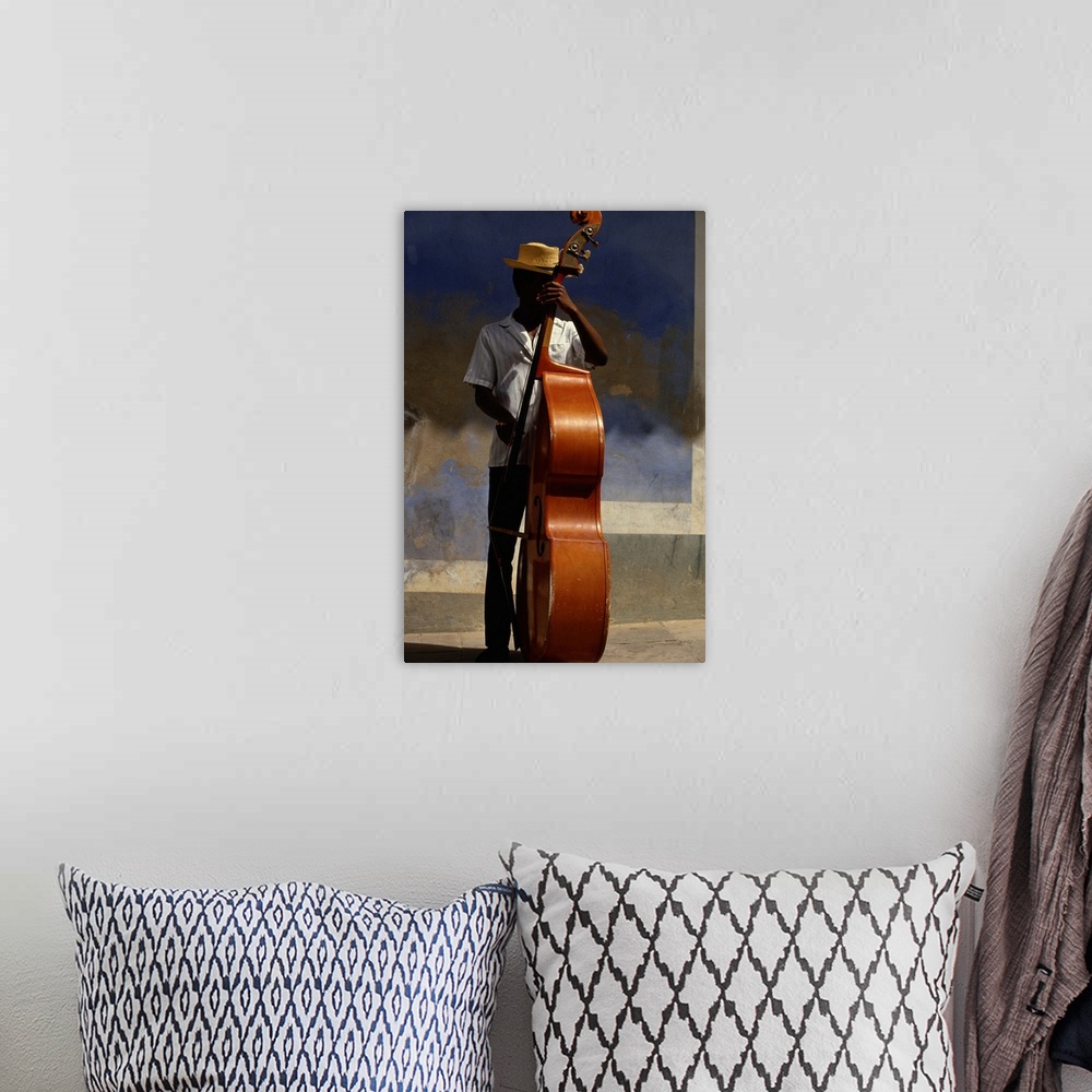A bohemian room featuring Man with a Jazz Bass, Trinidad in Cuba