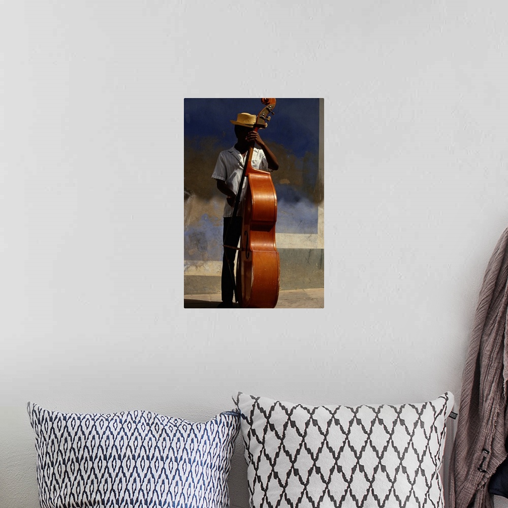 A bohemian room featuring Man with a Jazz Bass, Trinidad in Cuba