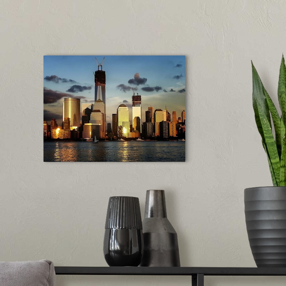 A modern room featuring Picture of Manhattan, NY at sunset from Jersey City, NJ