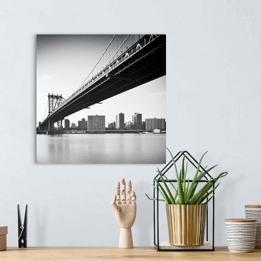 A bohemian room featuring Manhattan Bridge and skyline, New York, US.