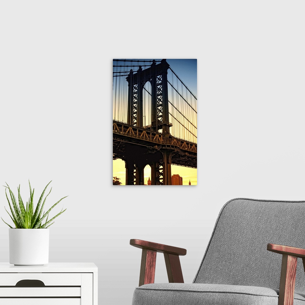 A modern room featuring Manhatten Bridge Brooklyn, New York City sunset.