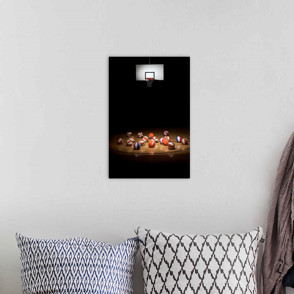 A bohemian room featuring Many basketballs resting on the floor