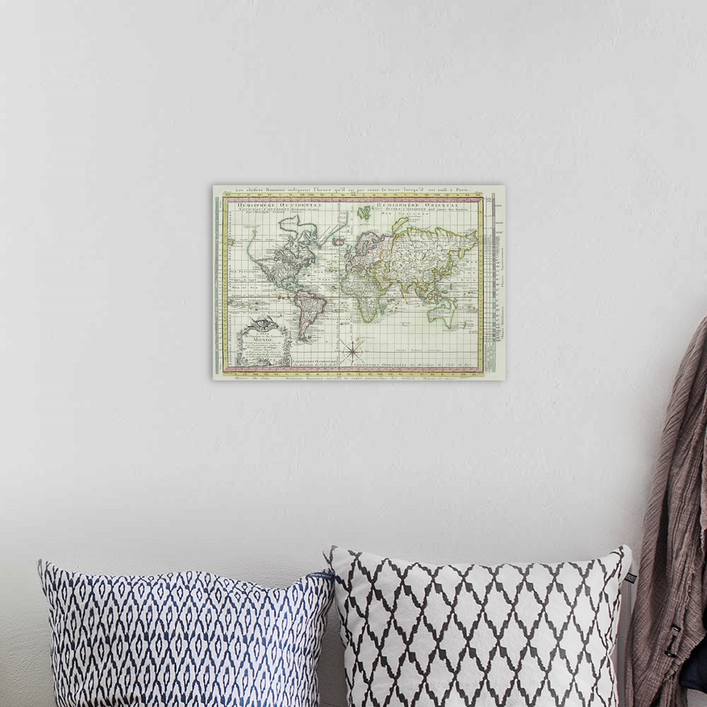 A bohemian room featuring An antique map of the world when the United States was being discovered. A grid is overlaid onto ...