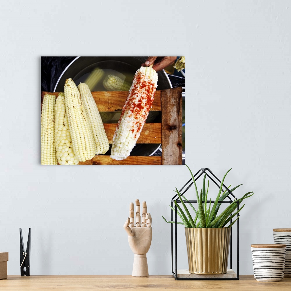 A bohemian room featuring Mexican corn with chile