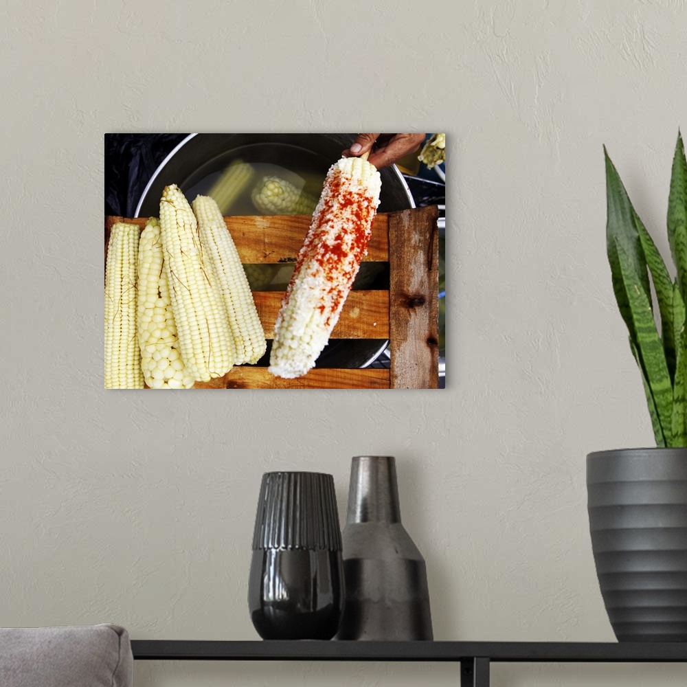 A modern room featuring Mexican corn with chile