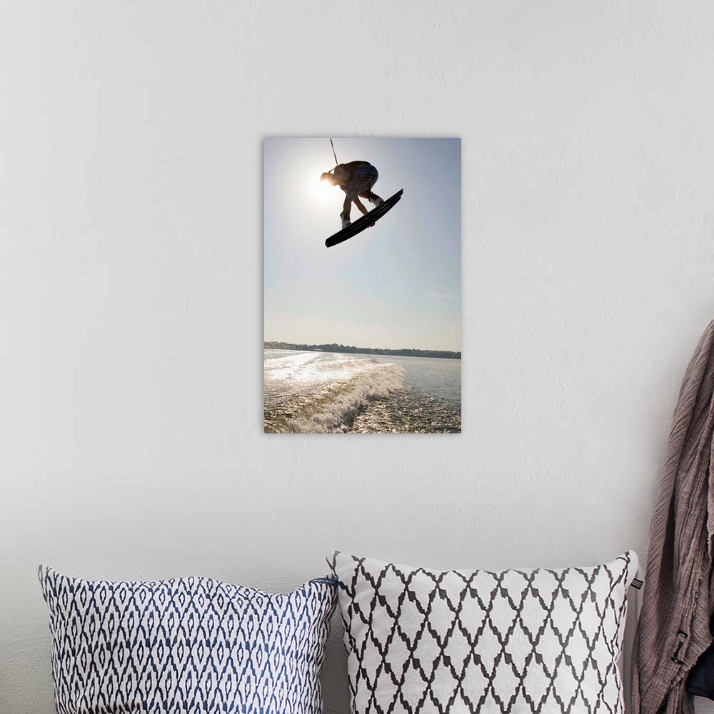 A bohemian room featuring Midair wakeboarder