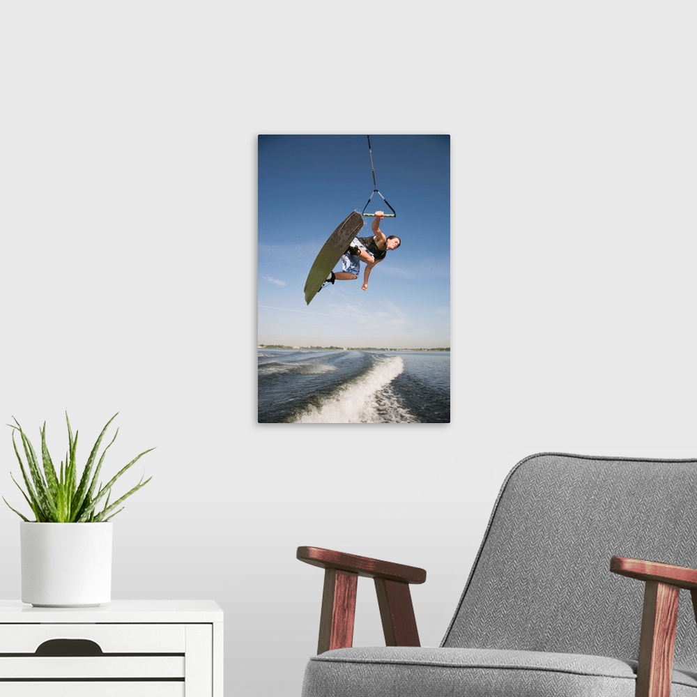 A modern room featuring Midair wakeboarder