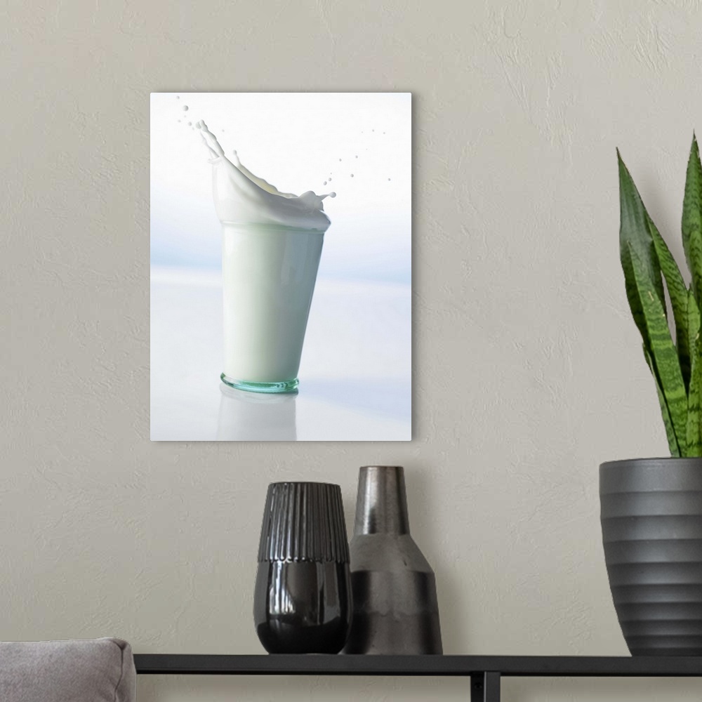 A modern room featuring Milk splashing in glass