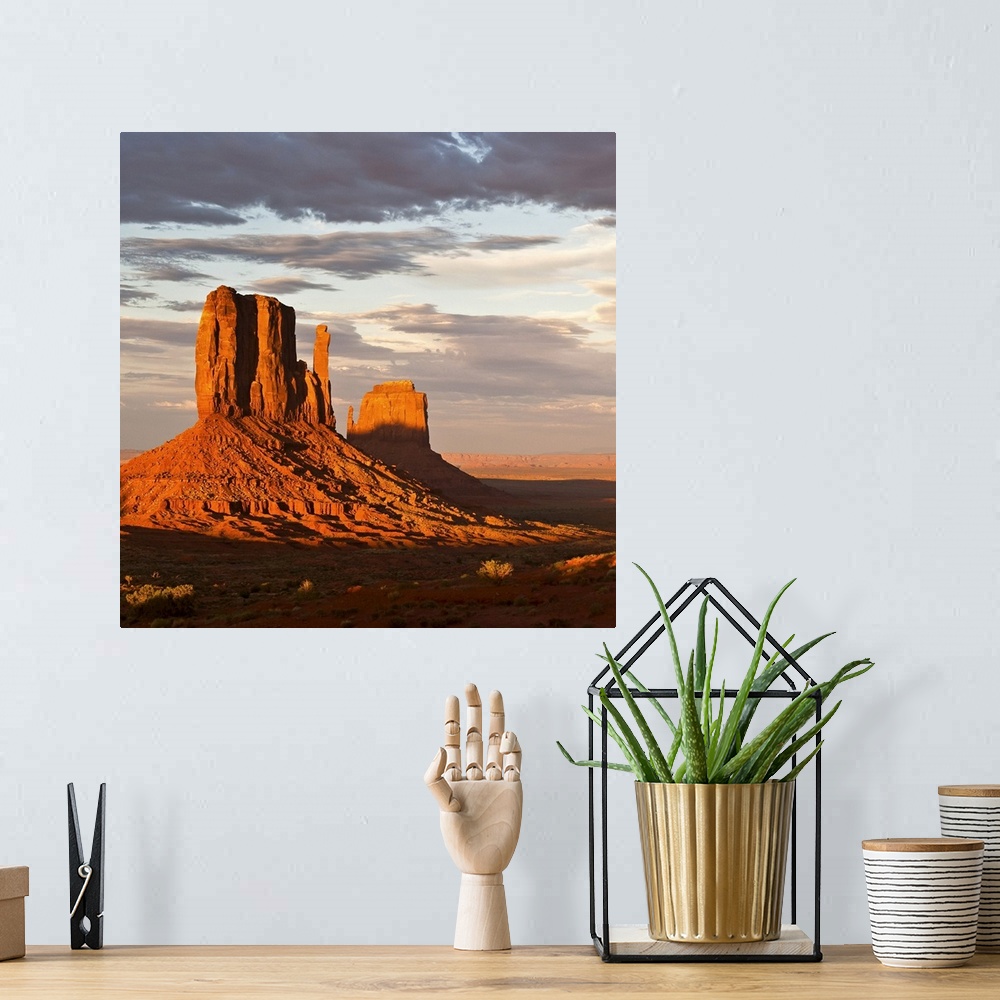 A bohemian room featuring Mittens of Monument Valley at sunset, US.