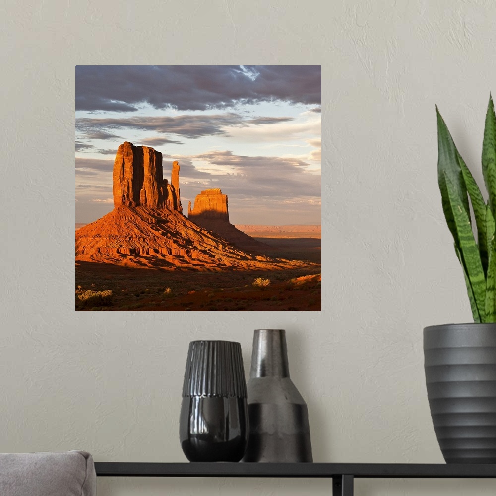A modern room featuring Mittens of Monument Valley at sunset, US.