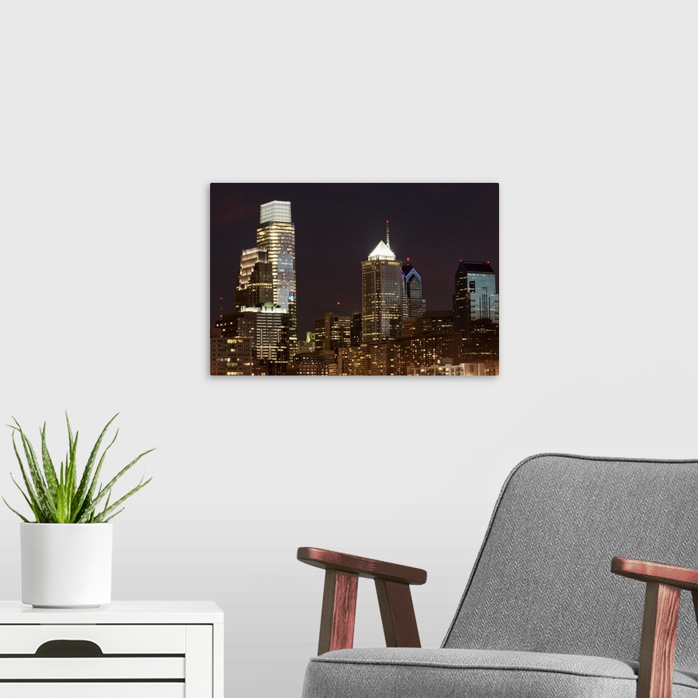 A modern room featuring Decorative wall art for the home or office this is urban photograph is of the top halves of skysc...