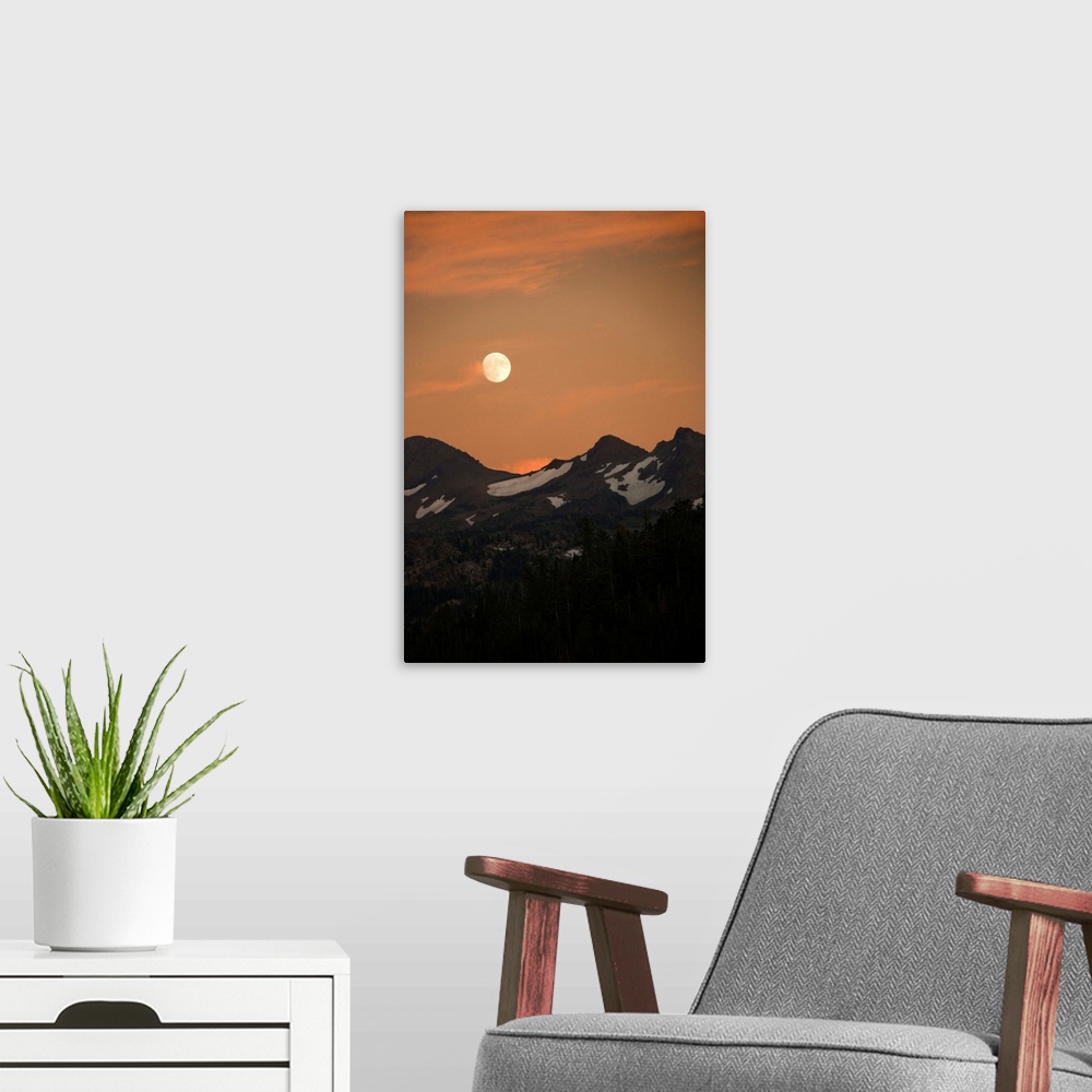 A modern room featuring Moon over mountain range