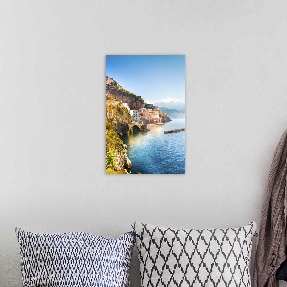 A bohemian room featuring Morning view of Amalfi cityscape on coast line of mediterranean sea, Italy.