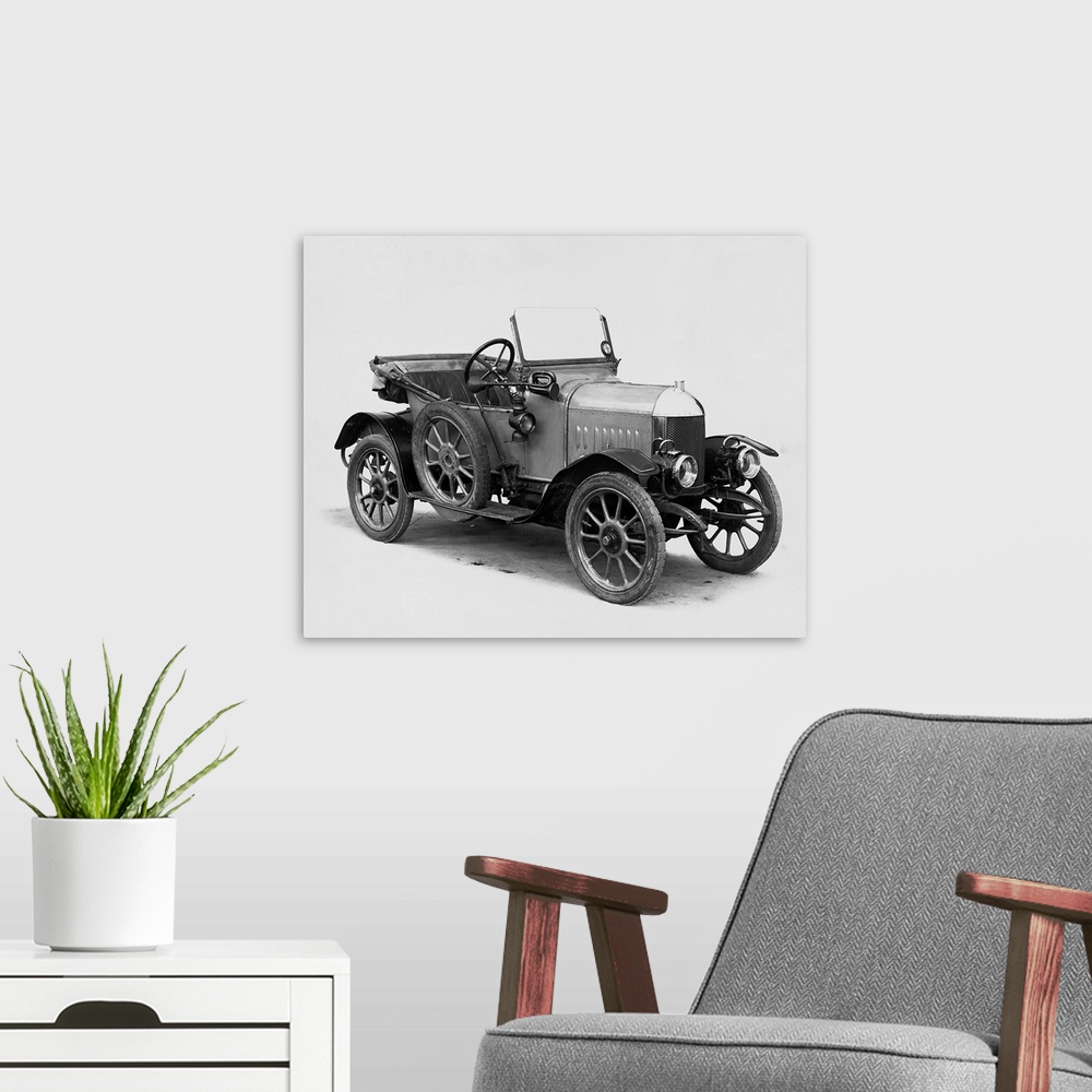 A modern room featuring A member of early automobile history: the first Morris Oxford two-seater convertible built in 1913.