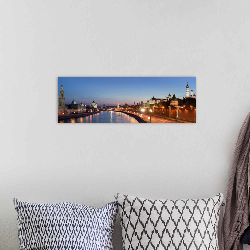 A bohemian room featuring Russia, Moscow, Moscow River, Cityscape with Cathedral of Christ the Saviour and Kremlin at dusk