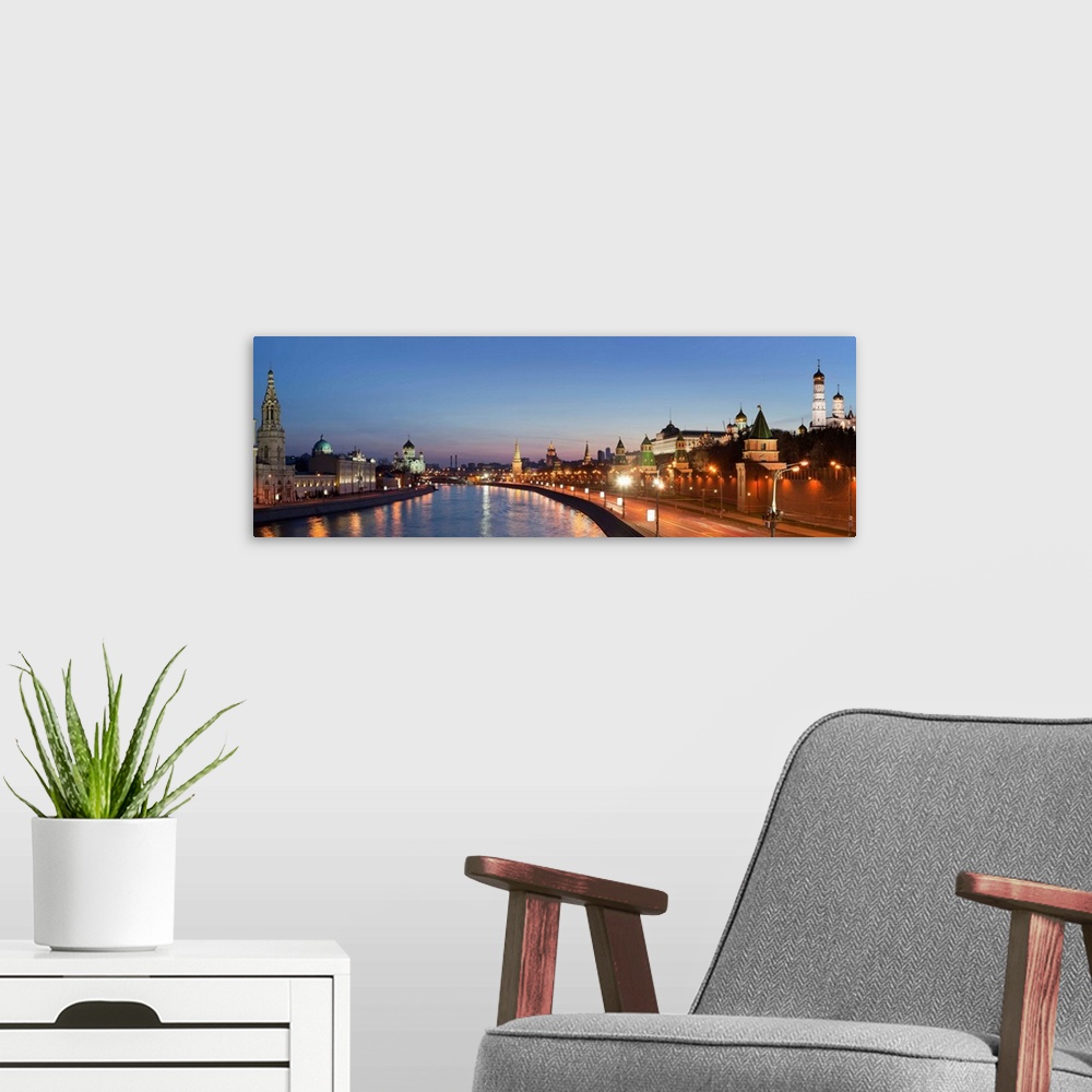A modern room featuring Russia, Moscow, Moscow River, Cityscape with Cathedral of Christ the Saviour and Kremlin at dusk