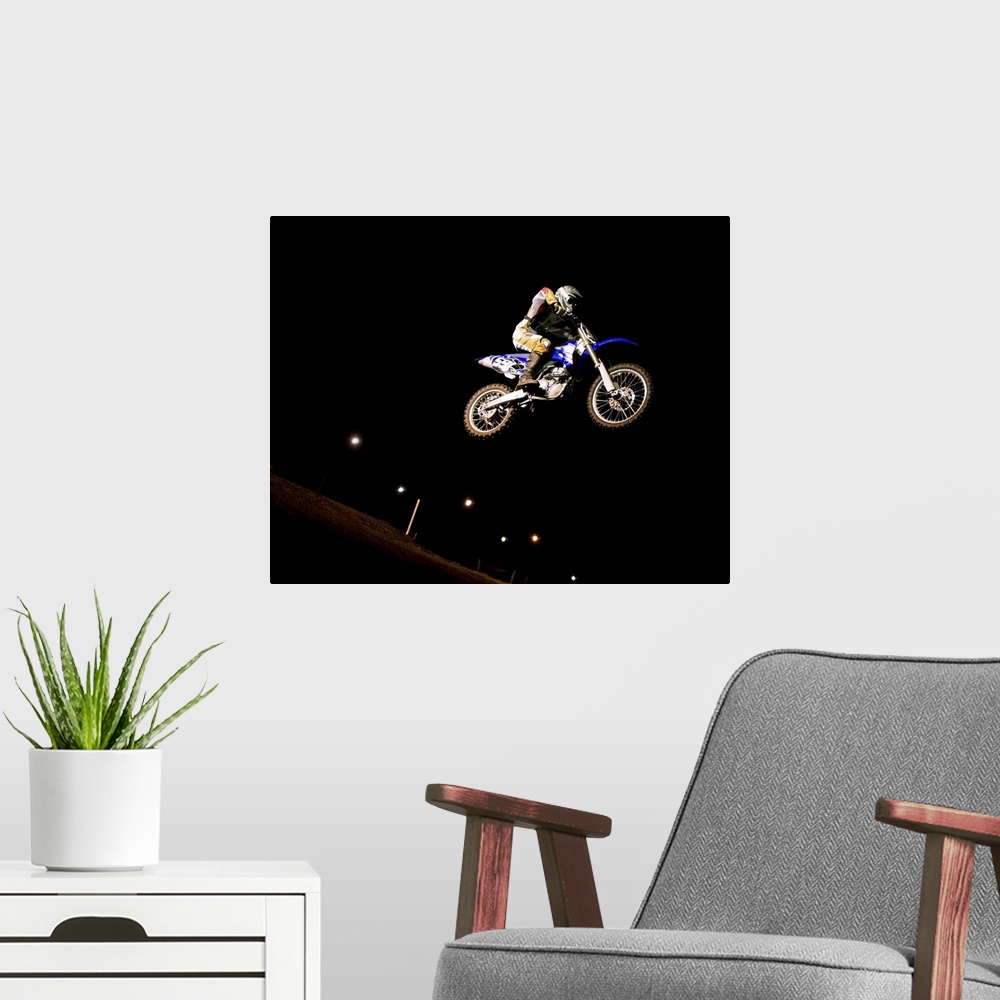 A modern room featuring Motorcross rider