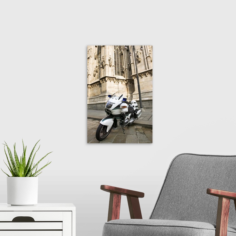 A modern room featuring Motorcycle parked outside Duomo di Milano, Milan, Italy