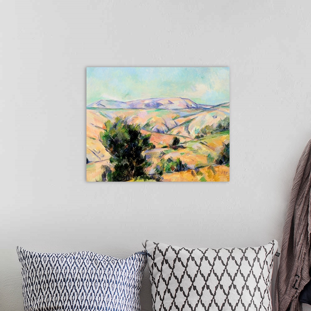 A bohemian room featuring Mountain Landscape By Paul Cezanne