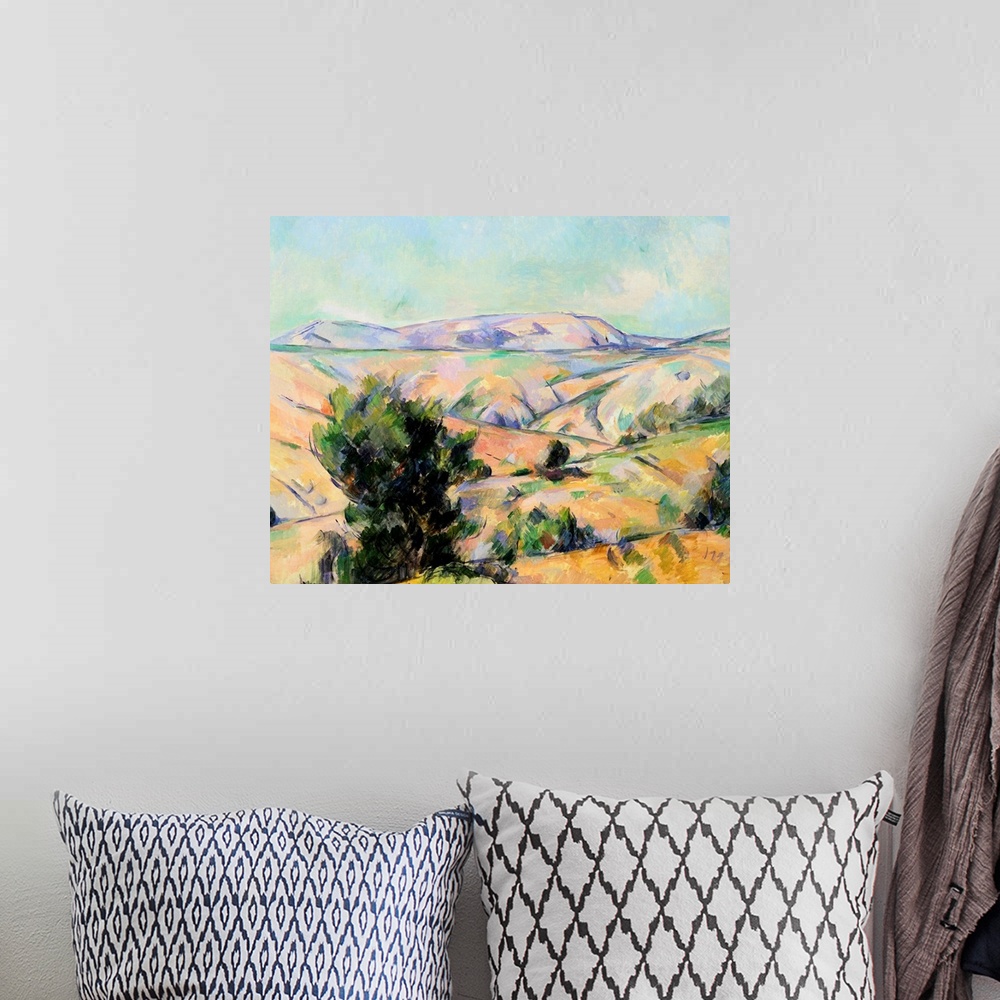 A bohemian room featuring Mountain Landscape By Paul Cezanne