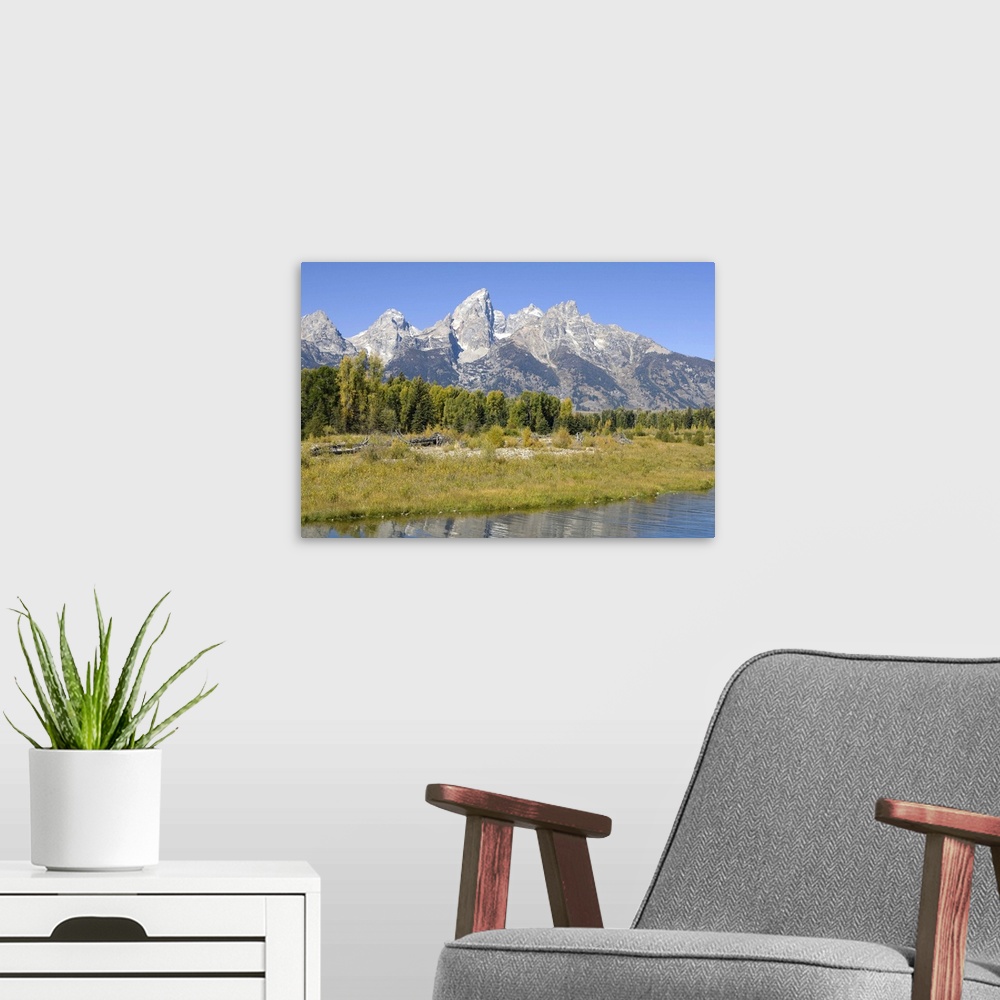 A modern room featuring Mountains by lake in Grand Teton National Park, Jackson, Wyoming