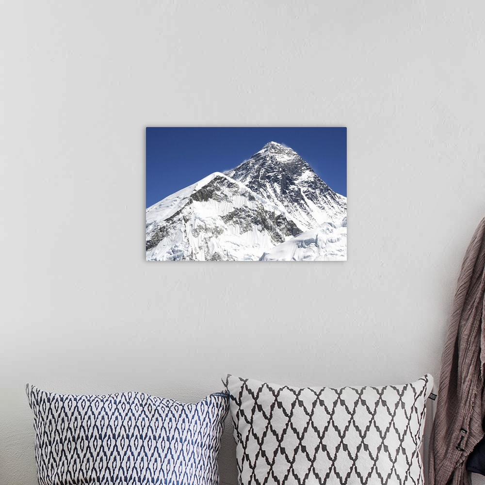 A bohemian room featuring Mt. Everest, the top of the world