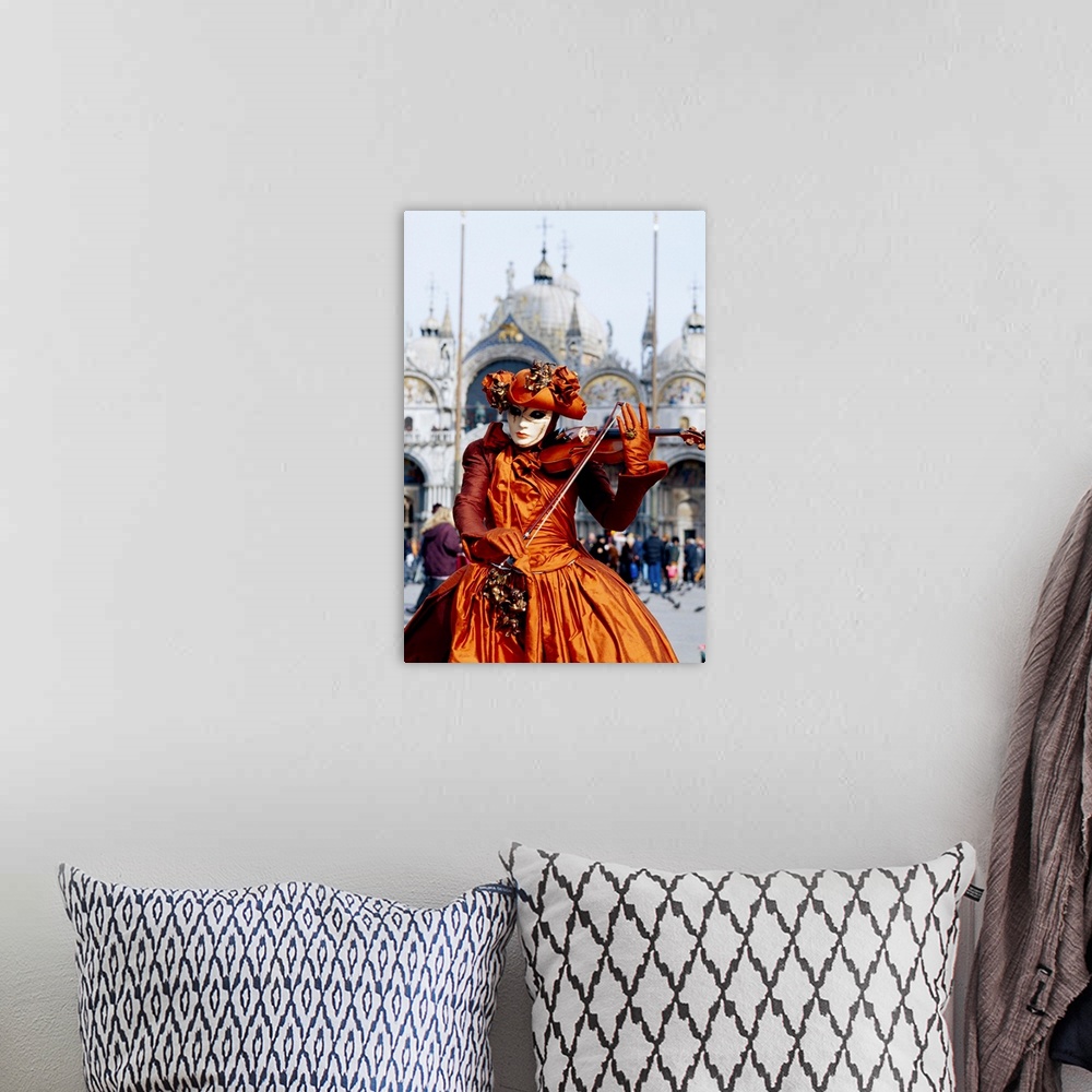 A bohemian room featuring Musician at carnival, Venice, Italy
