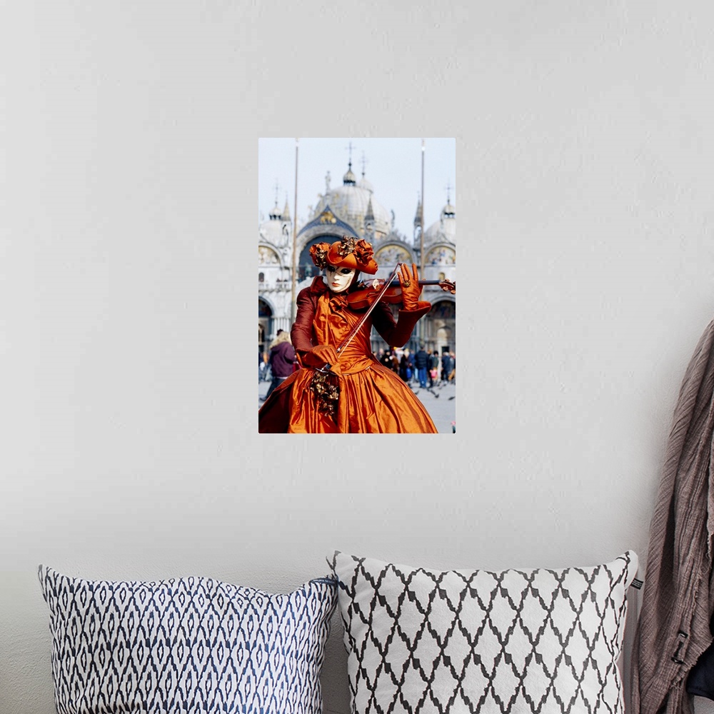 A bohemian room featuring Musician at carnival, Venice, Italy