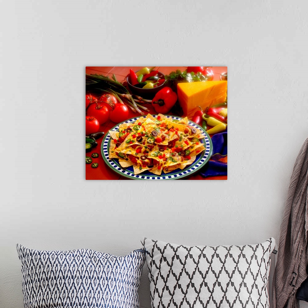 A bohemian room featuring Horizontal photograph on a big canvas of a plate of loaded nachos, the fresh ingredients used on ...